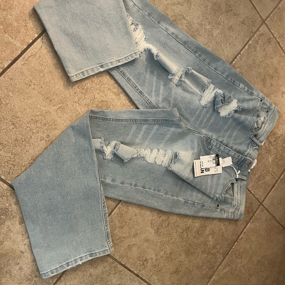 Women’s Light Blue Distressed Jeans